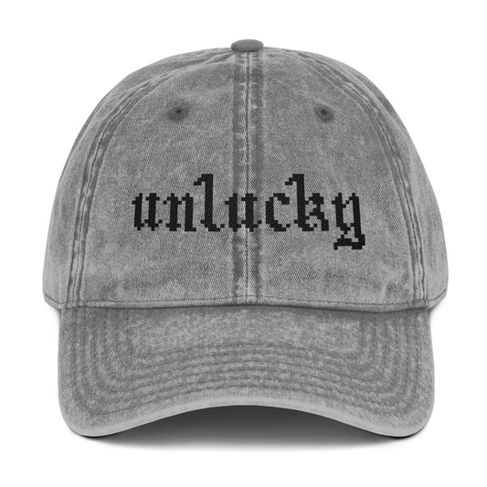 unlucky hat - black text.