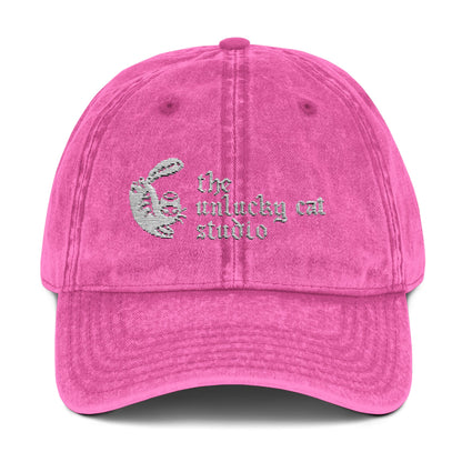 white logo hat.