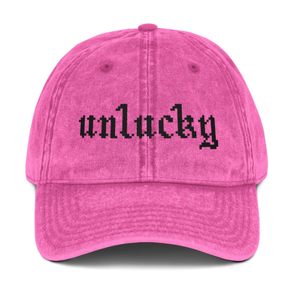 unlucky hat - black text.